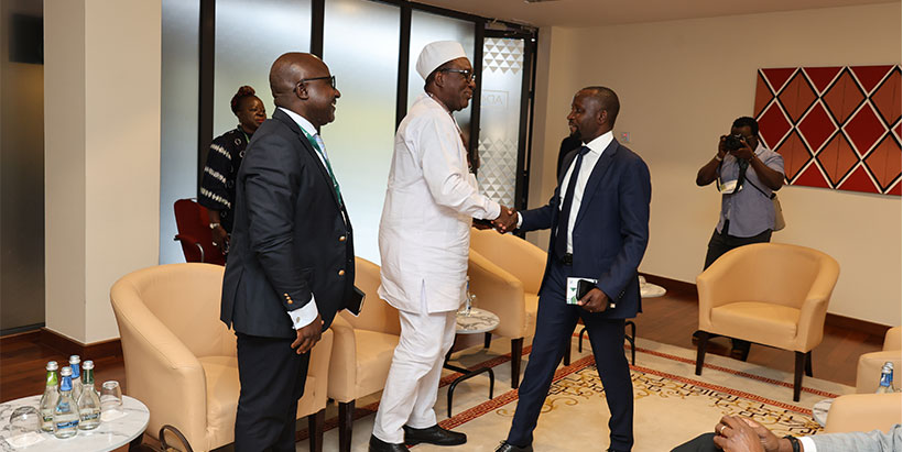 Rwanda's Minister of Agriculture, Dr. Ildephonse Musafiri welcoming Dr. Simeon Ehui.