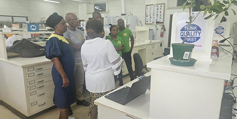 STP staff discussing with Dr. Agre (Molecular Breeder) and Prof Abberton (head of GRC).