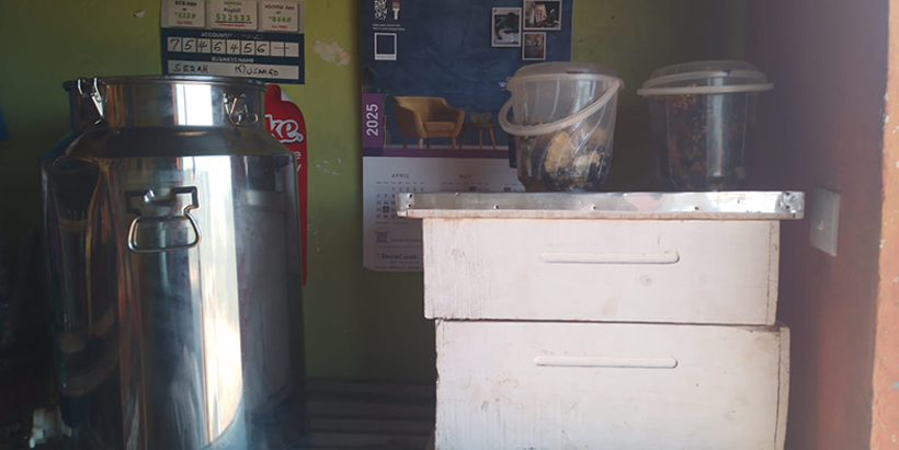 Sarah Musango's new honey settling tank and beehives