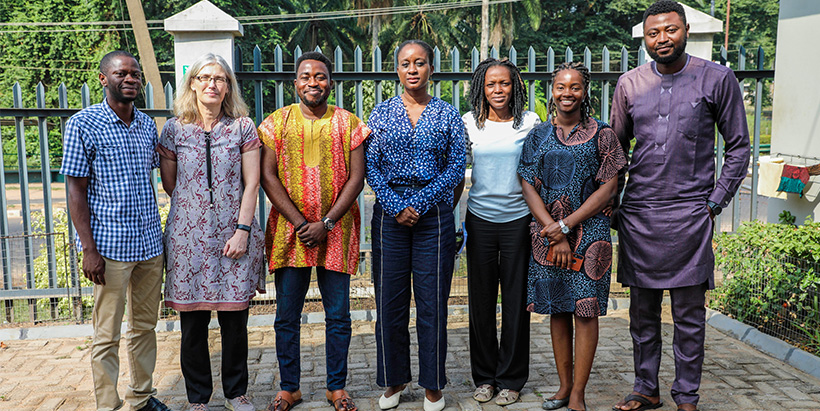 The IITA team, with Inqaba and Redclay associates, outside the Inqaba Biotec West Africa building.