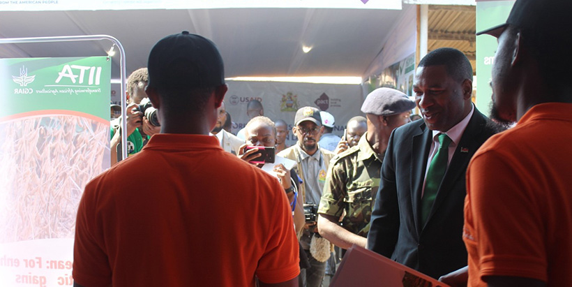 The Malawi Minister of Agriculture Hon Sam Kawale visiting IITA pavilion.