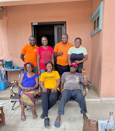 The entire research team with a woman processor and her husband, at Umuakpu community in Imo State.