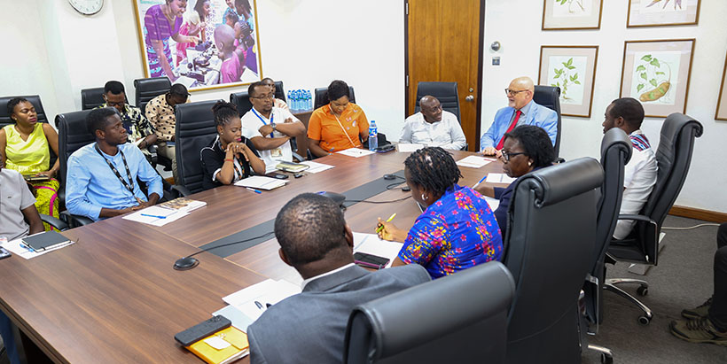 The former Minister of Agriculture in Equatorial Guinea, H.E. Victor Grange in a meeting with IITA representatives and partners.