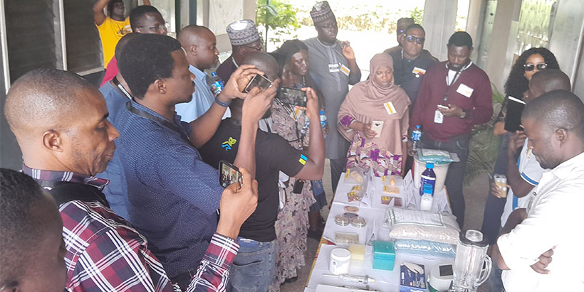 The participants on a tour to Aflasafe laboratory.