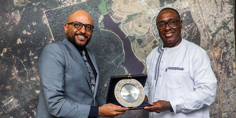 WorldFish Center Director General Essam Yassin Mohammed presenting a gift to IITA Director General and CGIAR Regional Director for Continental Africa Dr Simeon Ehui at IITA headquarters.