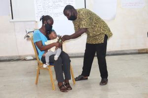 MUAC Tape demonstration at the training.