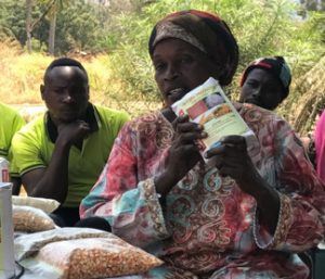 Picture of Julie holding the nutritional soy flour.
