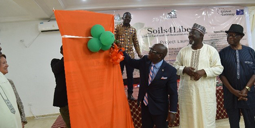 Representatives from the Ministry of Agriculture, the European Union, and IITA during the ribbon-cutting at the launch of the Soils4Liberia Project