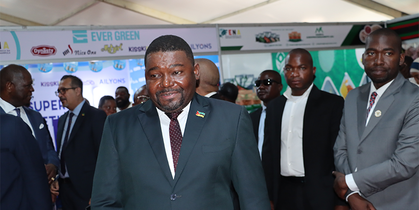 Economy Minister of Mozambique visiting the IITA stand during the exhibition.