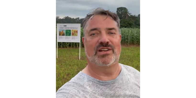 Dr Stanford Blade at the ICRISAT demonstration plot at IITA, showcasing new varieties of sorghum, groundnut, and finger millet. (Photo credit: Dr Stanford Blade).